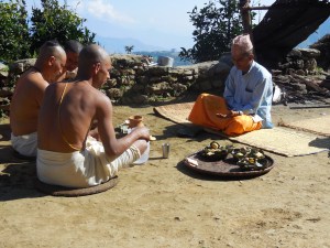 Performing the puja to honor their mother.